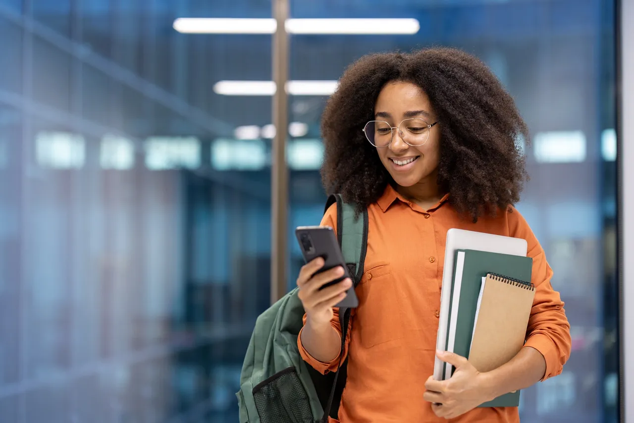 Student sending money with B360X mobile app